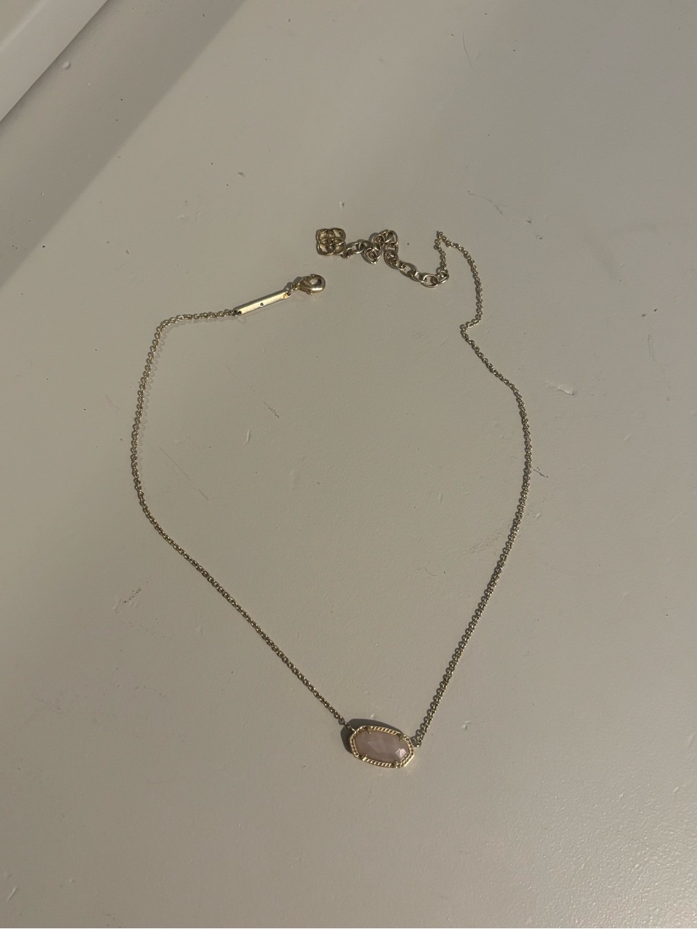 Kendra Scott Gold Necklace with Pale Pink Oval Stone